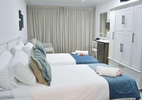 Cama o camas de una habitación en Diaz Ocean View Hotel