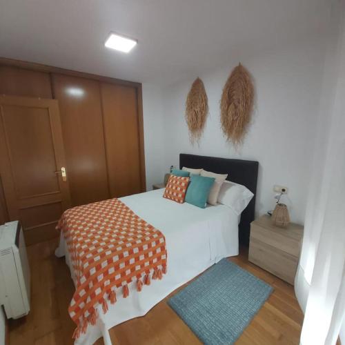Postel nebo postele na pokoji v ubytování Apartamento Baiona 1 habitación Rúa Brasil