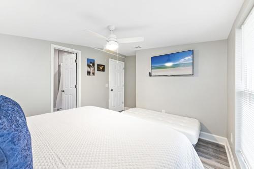 Katil atau katil-katil dalam bilik di Coastal Dreams Beach House