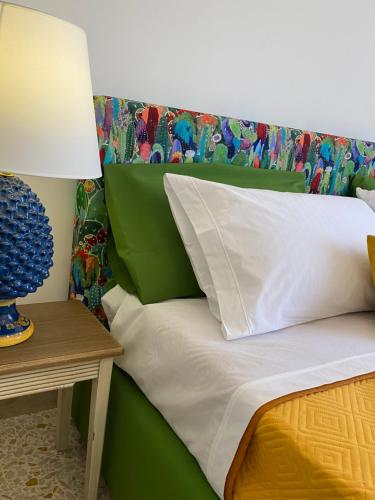 Ein Bett oder Betten in einem Zimmer der Unterkunft Casa Graziusa