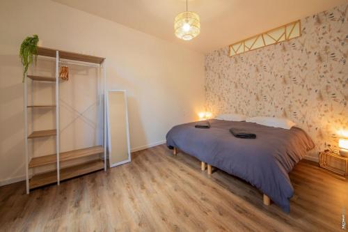 Posteľ alebo postele v izbe v ubytovaní Ma Location Gaillacoise - APPARTEMENT TOUT CONFORT - HYPERCENTRE - 58m2 - GAILLAC