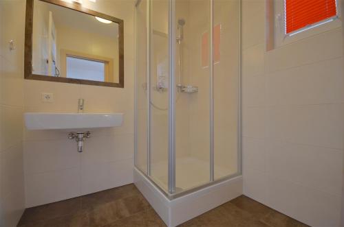 Vonios kambarys apgyvendinimo įstaigoje Apartment Igor - by Alpen Apartments