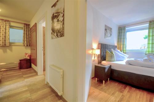 Posteľ alebo postele v izbe v ubytovaní Apartment Konstanzia - by Alpen Apartments