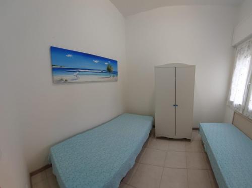 Ένα ή περισσότερα κρεβάτια σε δωμάτιο στο RESIDENCE AL CAVALLINO