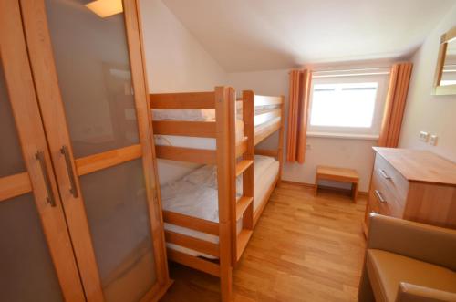 Postel nebo postele na pokoji v ubytování Penthouse Cooper - by Alpen Apartments