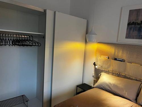 En eller flere senger på et rom på 1A-Precioso Apartamento en pleno centro. A estreno