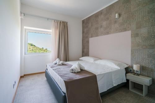 Katil atau katil-katil dalam bilik di Cilento Victory House