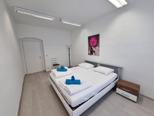 Postel nebo postele na pokoji v ubytování Rosens Wien