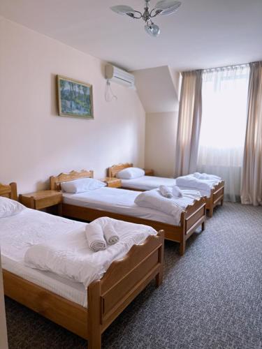 Postel nebo postele na pokoji v ubytování SameТой