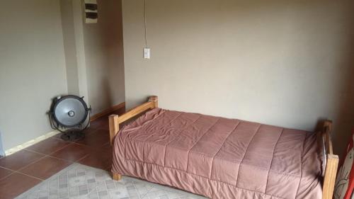 Postel nebo postele na pokoji v ubytování Casa en Pueblo Centenario