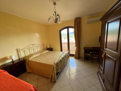 Ένα ή περισσότερα κρεβάτια σε δωμάτιο στο Villa Lia Cilento