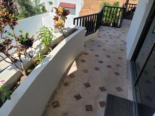 a view from the balcony of a house with a patio at hotel stella maris tulum in Tulum