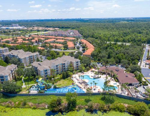 an aerial view of a resort with a pool at LUXURIOUS CONDO - JUST 2 MILES FROM DISNEY #404 in Orlando