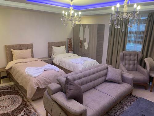 Una cama o camas en una habitación de Eyüpsultan ABS Suites