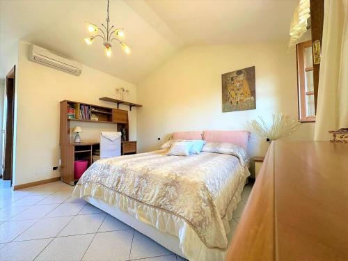Voodi või voodid majutusasutuse Villetta La Panoramica by Nicola Real Estate toas