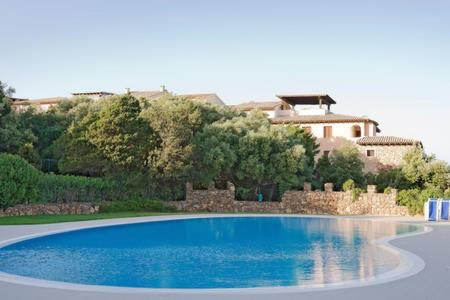 The swimming pool at or close to Deluxe Apartments in Porto Rotondo