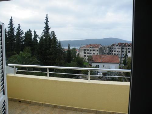 a balcony with a view of a city at Apartments Viktoria in Tivat