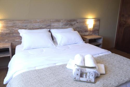 Ένα ή περισσότερα κρεβάτια σε δωμάτιο στο Sky Samuara Hotel Caxias do Sul