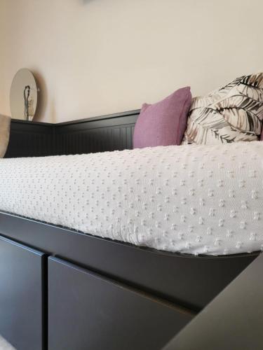 a close up of a bed with a mattress at Atrium in Castellammare del Golfo