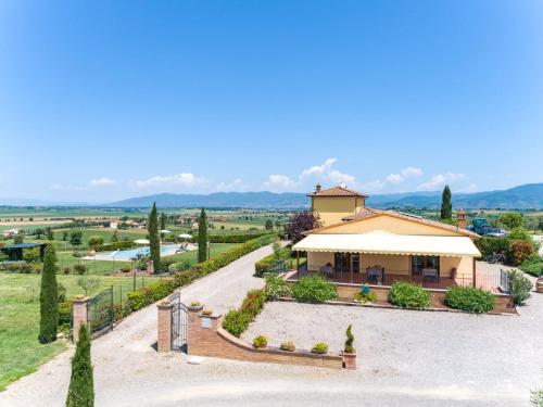 an aerial view of a villa with a house at Corte Delle Stelle in Cortona