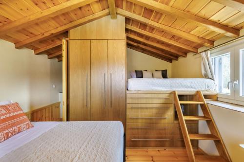 Ένα ή περισσότερα κρεβάτια σε δωμάτιο στο Villa Nirvana