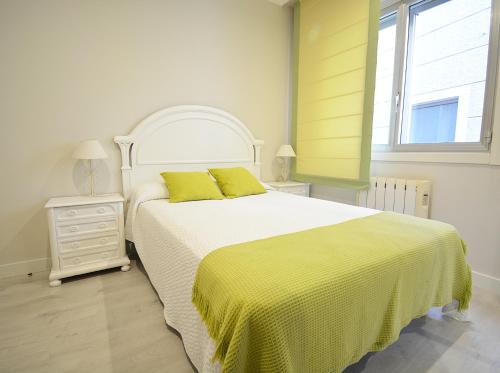 Posteľ alebo postele v izbe v ubytovaní GALIHOST - Apartamento en pleno centro de Portonovo, Sanxenxo