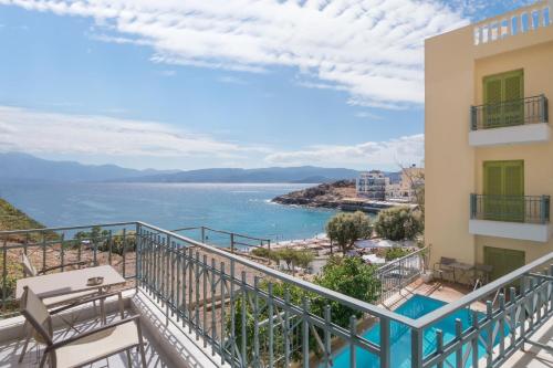 a balcony with a view of the ocean at Mare Hotel Apartments in Agios Nikolaos