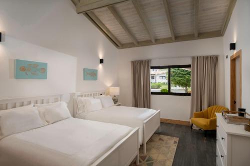 Postel nebo postele na pokoji v ubytování Villa Mar y Lago, Casa de Campo