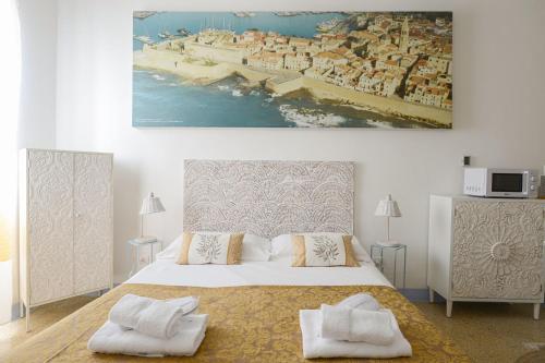A bed or beds in a room at Home de mar