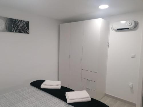 Posteľ alebo postele v izbe v ubytovaní Apartamento FELICIA