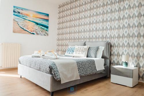 A bed or beds in a room at DOMUS 73 Apulian holidays