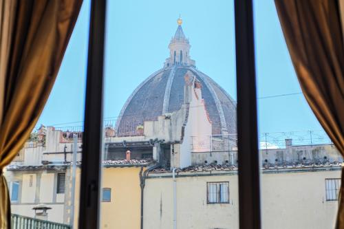 a view from a window of a building with a dome at The Art Luxury Home in Florence