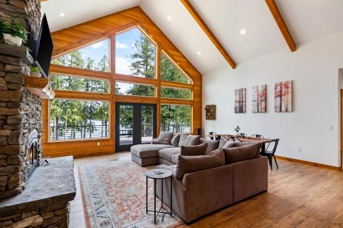 a living room with a couch and a fireplace at Willow Bay in Priest River