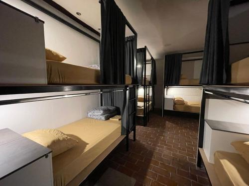 Postel nebo postele na pokoji v ubytování Ñañas Hostel