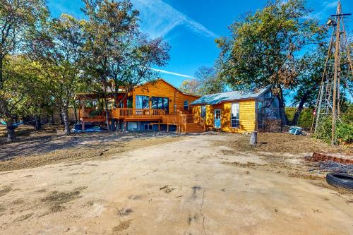 a house that is sitting on top of a dirt road at Ark Ranch in Princeton