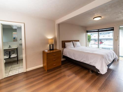 Ένα ή περισσότερα κρεβάτια σε δωμάτιο στο Terimore Lodging by the Sea