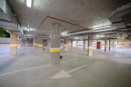 an empty parking lot in an empty parking garage at Zona aeropuerto dpto a estrenar! 202 in La Mercedes