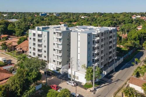 an overhead view of a white apartment building at Zona aeropuerto dpto a estrenar! 202 in La Mercedes