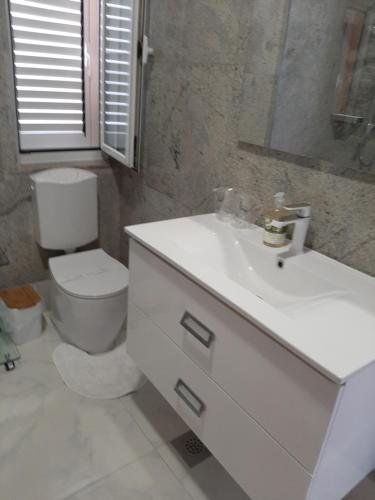 Koupelna v ubytování Villa Nives
