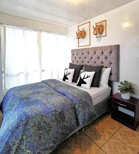 Cama o camas de una habitación en Cusco Kintu House