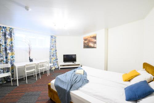 Postel nebo postele na pokoji v ubytování Stay to Stay Apartments - võtmeta sissepääs