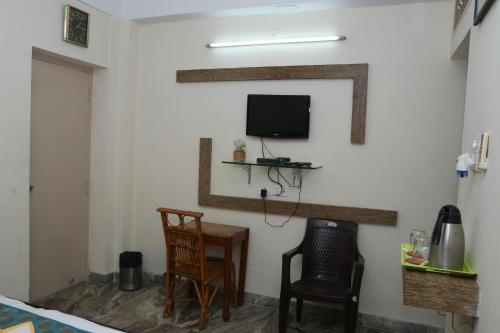 Μια τηλεόραση ή/και κέντρο ψυχαγωγίας στο The Elite Apartment Hotel