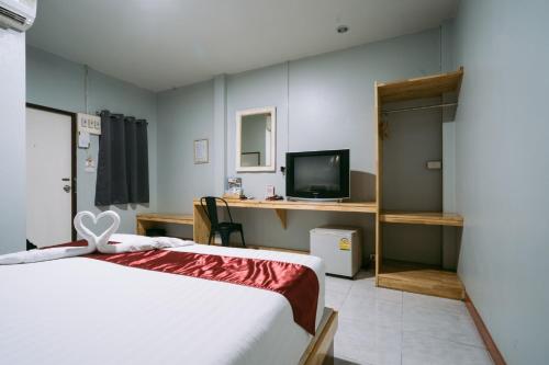 TV a/nebo společenská místnost v ubytování Jintana Resort