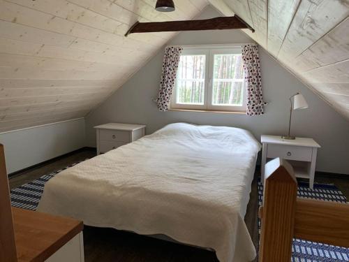 Postel nebo postele na pokoji v ubytování Private sauna house with sea view