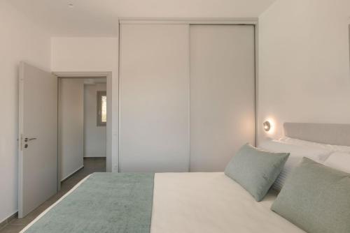 Letto o letti in una camera di Summertime Villas