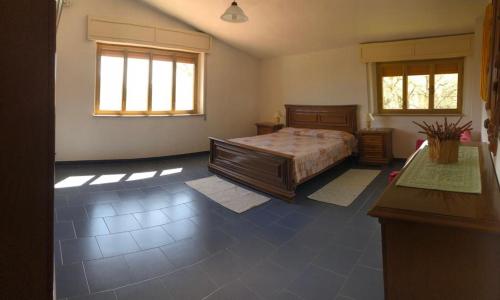 Ένα ή περισσότερα κρεβάτια σε δωμάτιο στο Casa Linda