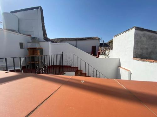 a view from the roof of a house with a balcony at Casa Cumbres in Cumbres de San Bartolomé