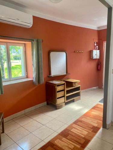 a dressing room with a mirror and a dresser at Apartment QUINTA DE AREIAS in Crespos