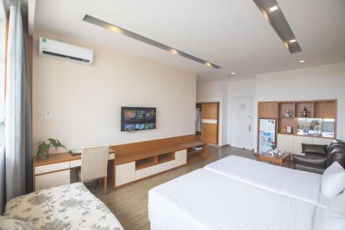 Ένα ή περισσότερα κρεβάτια σε δωμάτιο στο Sammy Hotel