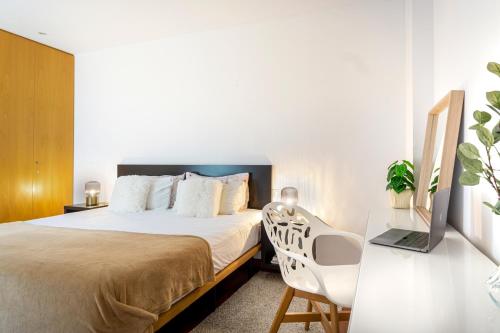 Posteľ alebo postele v izbe v ubytovaní Enjoy Apartments Maria II